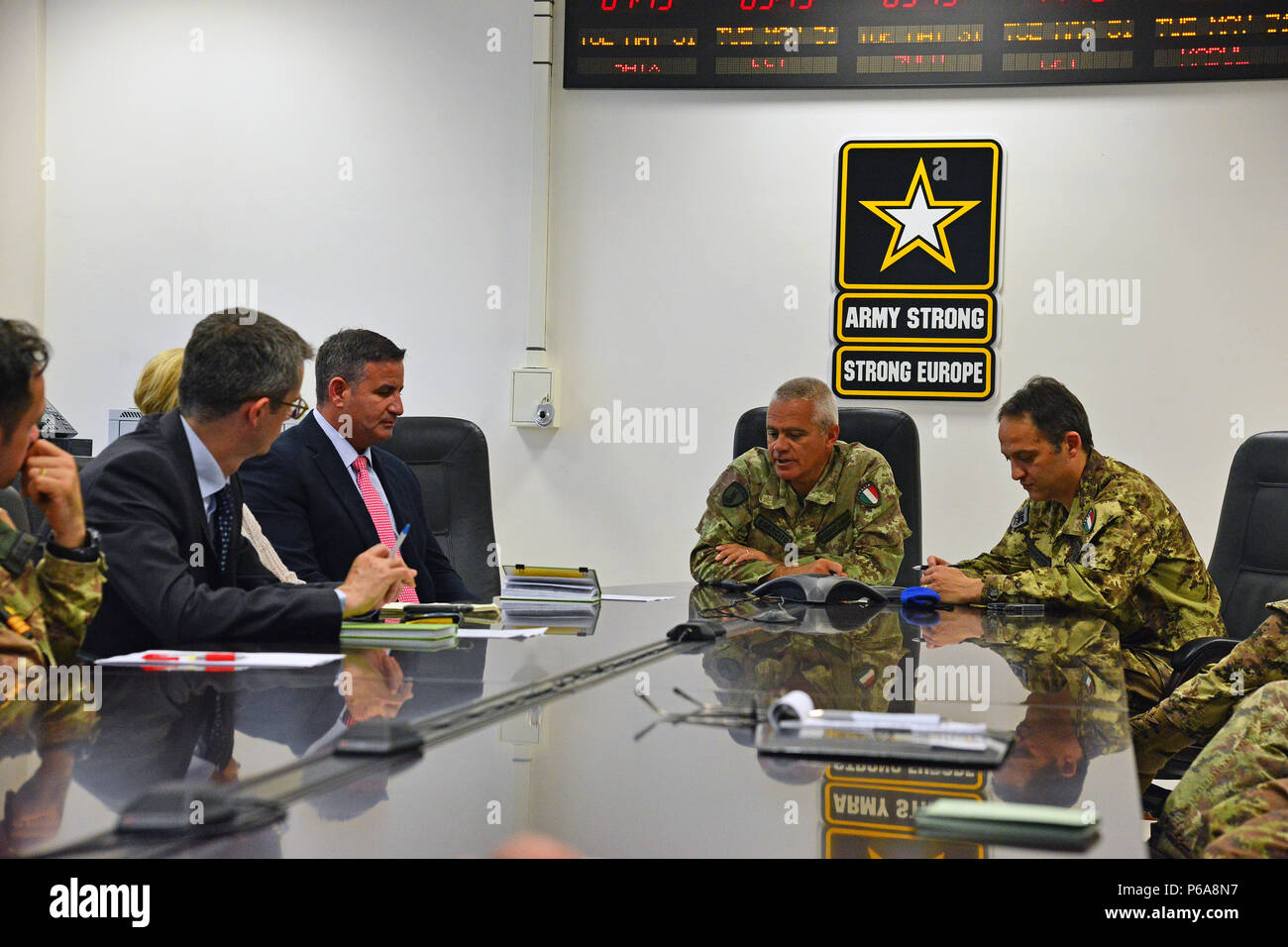 From left, Peter Brownfeld, USARAF Host Nation Adviser, Director Seifert Charles Matthew, Directorate of Plans Training Mobilization and Security “DPTMS”, Italian Army Colonel Federico Pognant Airassa, Public Information Officer, Land forces Operational Command “COMFOTER”, and Colonel Umberto D`Andria, Italian Base Commander Caserma Ederle, during the meeting media strategies in Caserma Ederle, Vicenza, Italy, May 31, 2016. Italian Army visit U.S. Army, in order to enhance to bilateral relations and to expand levels of cooperation and the capacity of the personnel involved in joint operations. Stock Photo